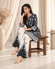 1 black and white stitched suit