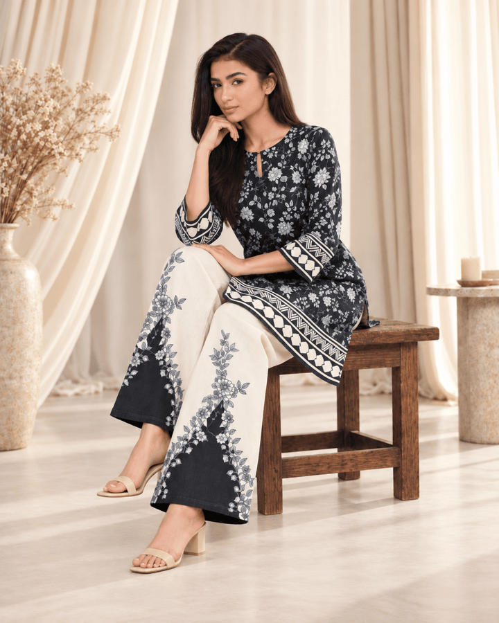 1 black and white stitched suit