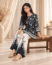 1 black and white stitched suit