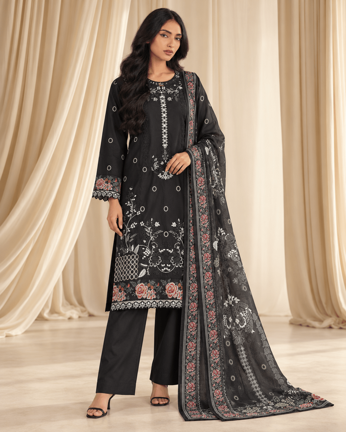 black embroidered stitched suit